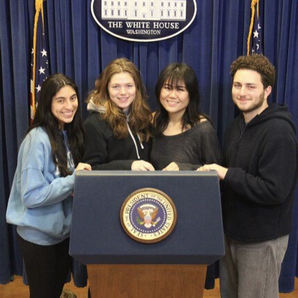 honors college students at white house podium