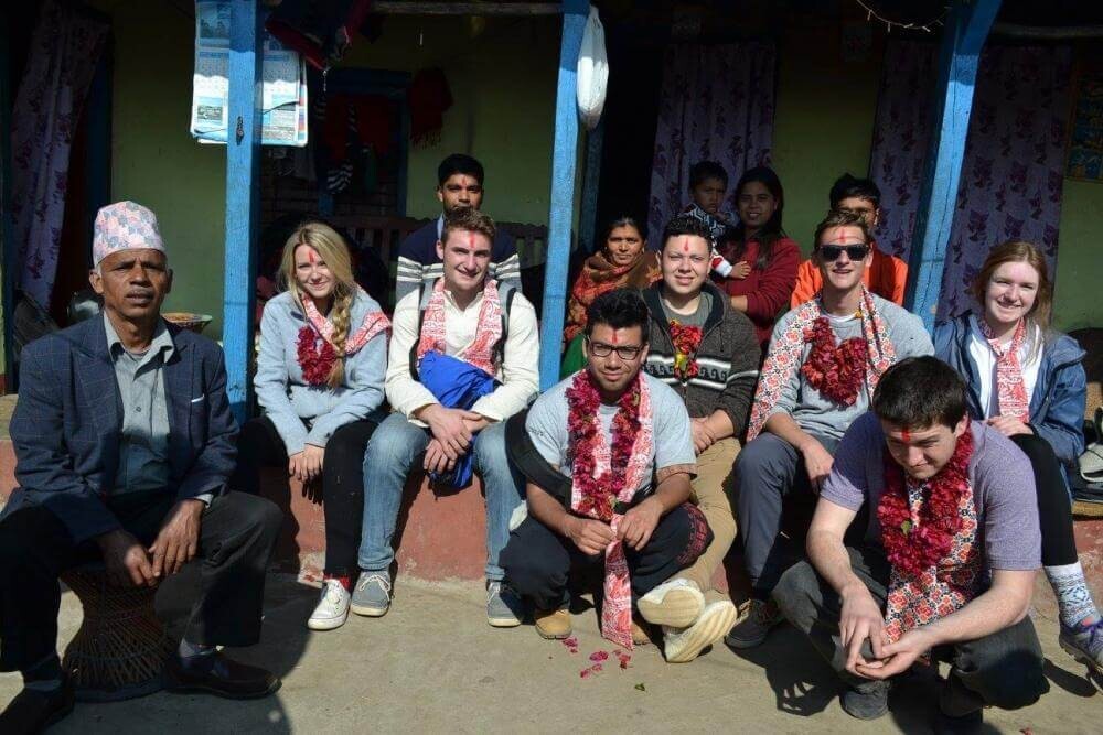 RVCC students with Nepalese family