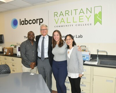 mike marion and 3 students in labcorp lab