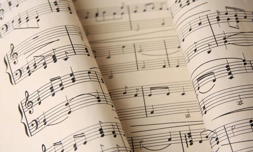 sheet music close up with bent pages