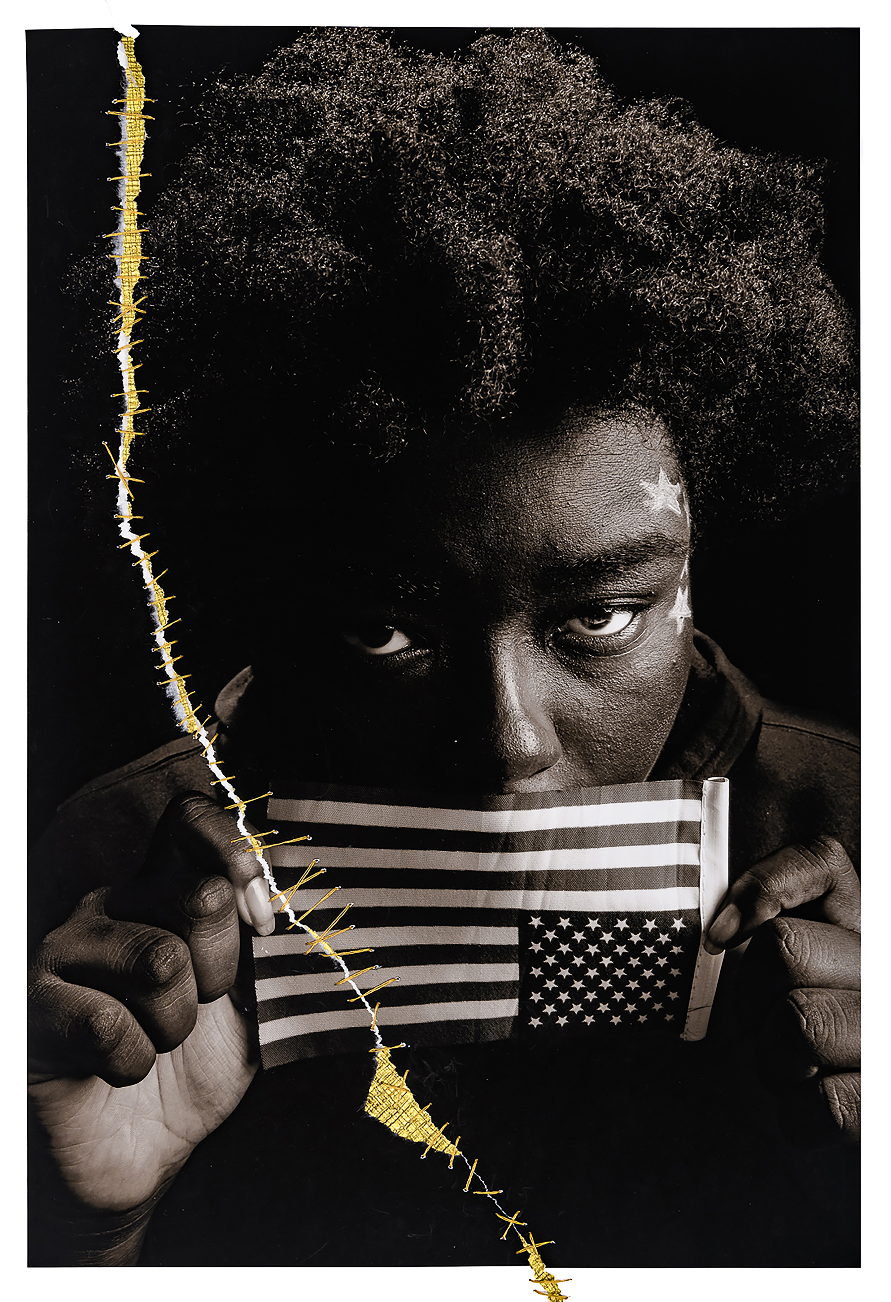 balck and white photo of person holding upside down american flag