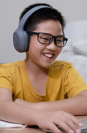 boy having fun on computer