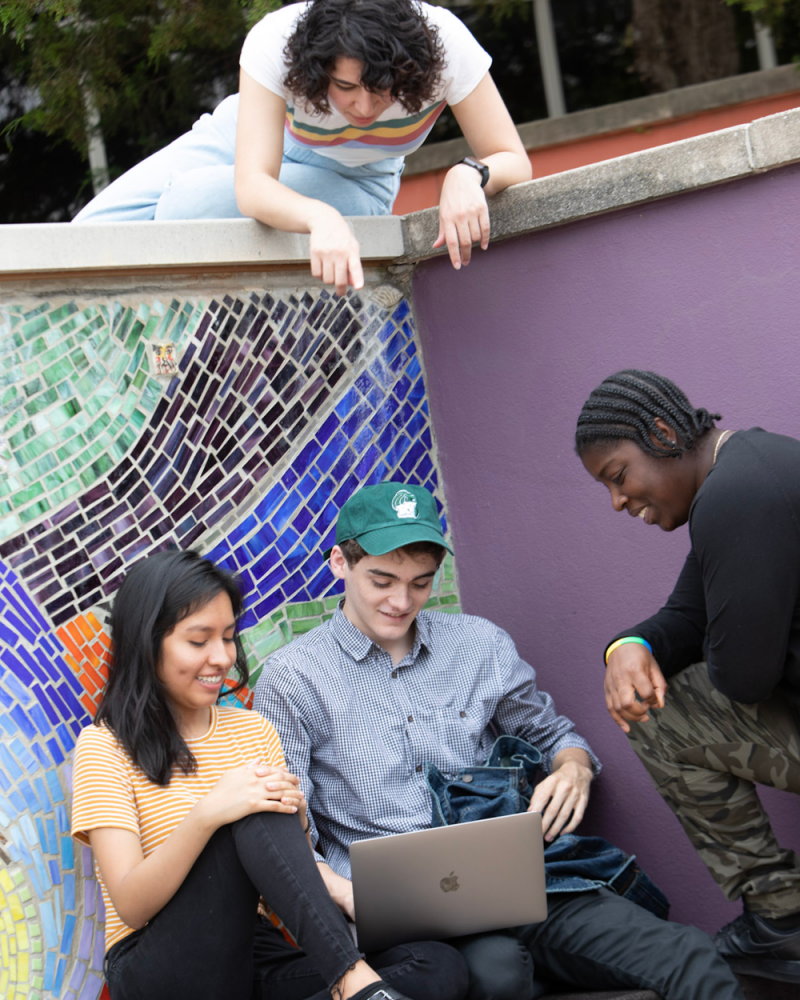 Students studying outdoors College Admission