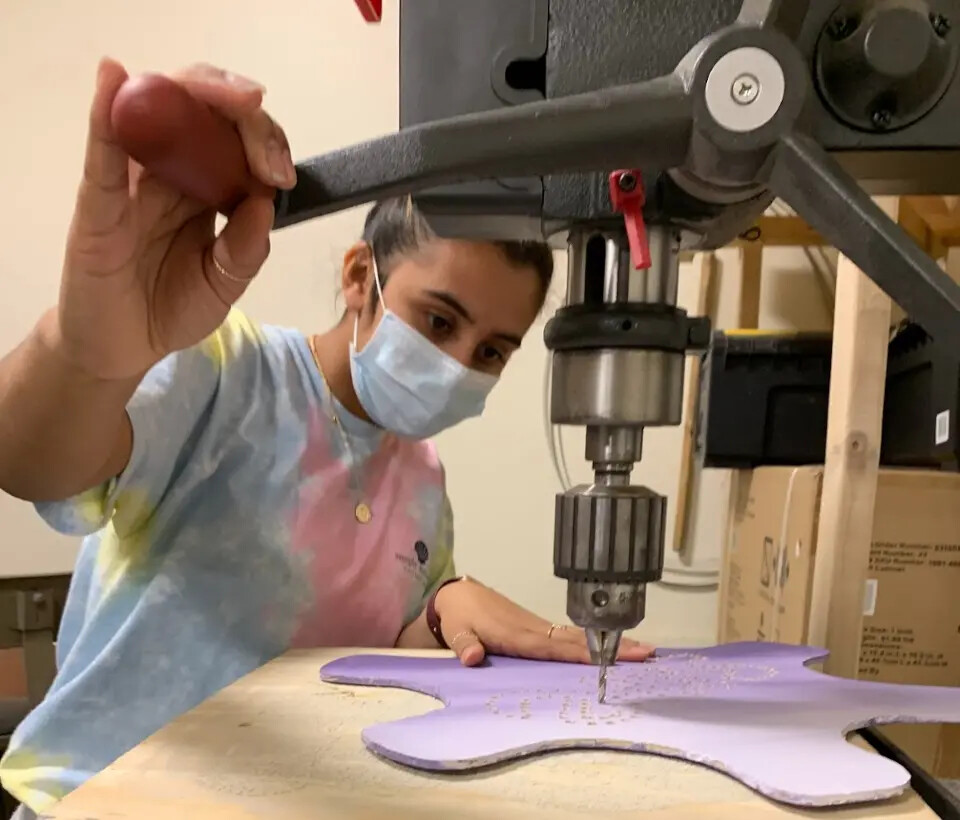 ange mendez works on drill press