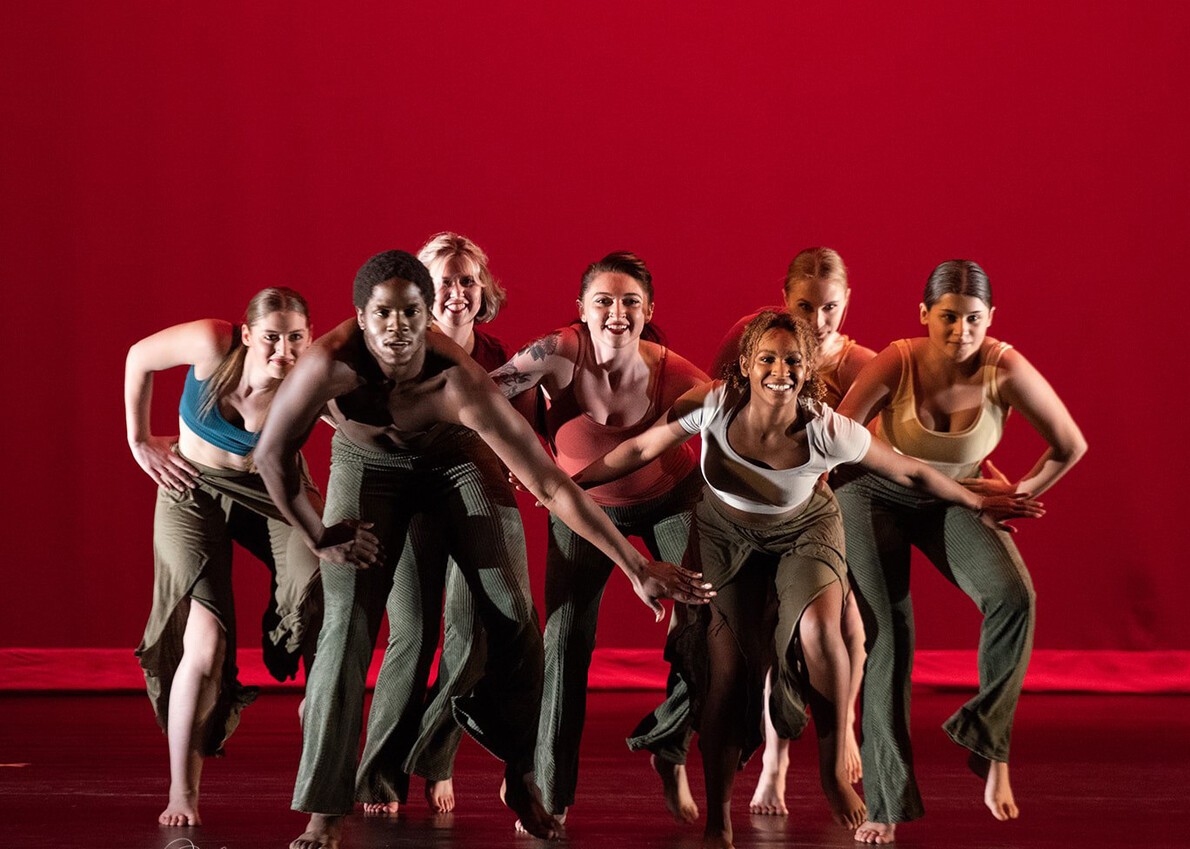 group of rvcc dancers with red background
