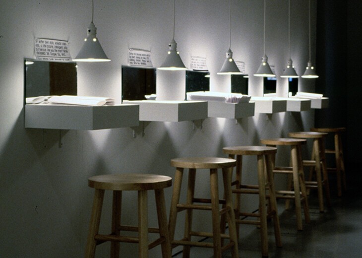 artwork with stools and lights