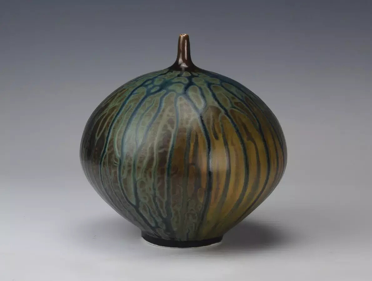 round porcelain bottle pic cropped at top