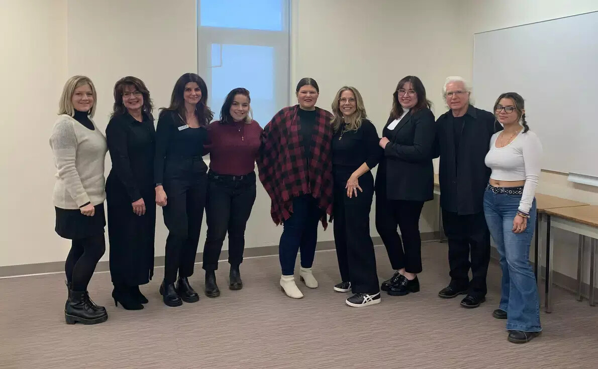 cosmetology students in lineup with beauty professionals