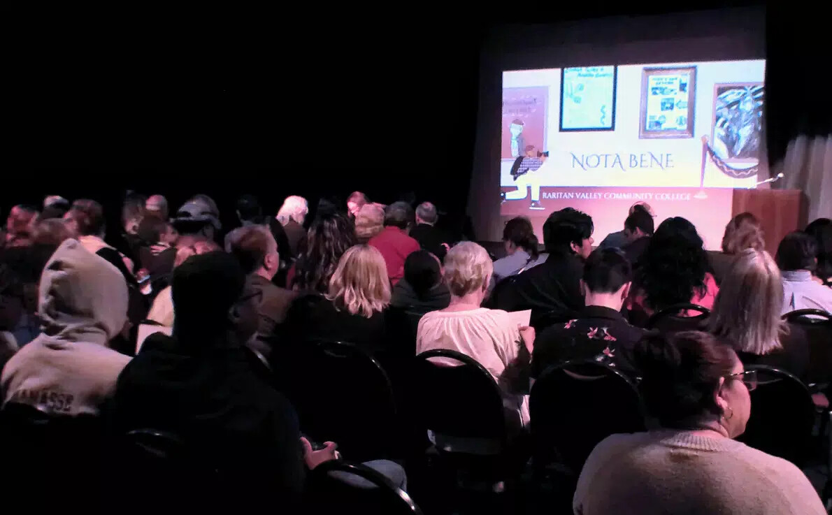audience watching nota bene event in theatre