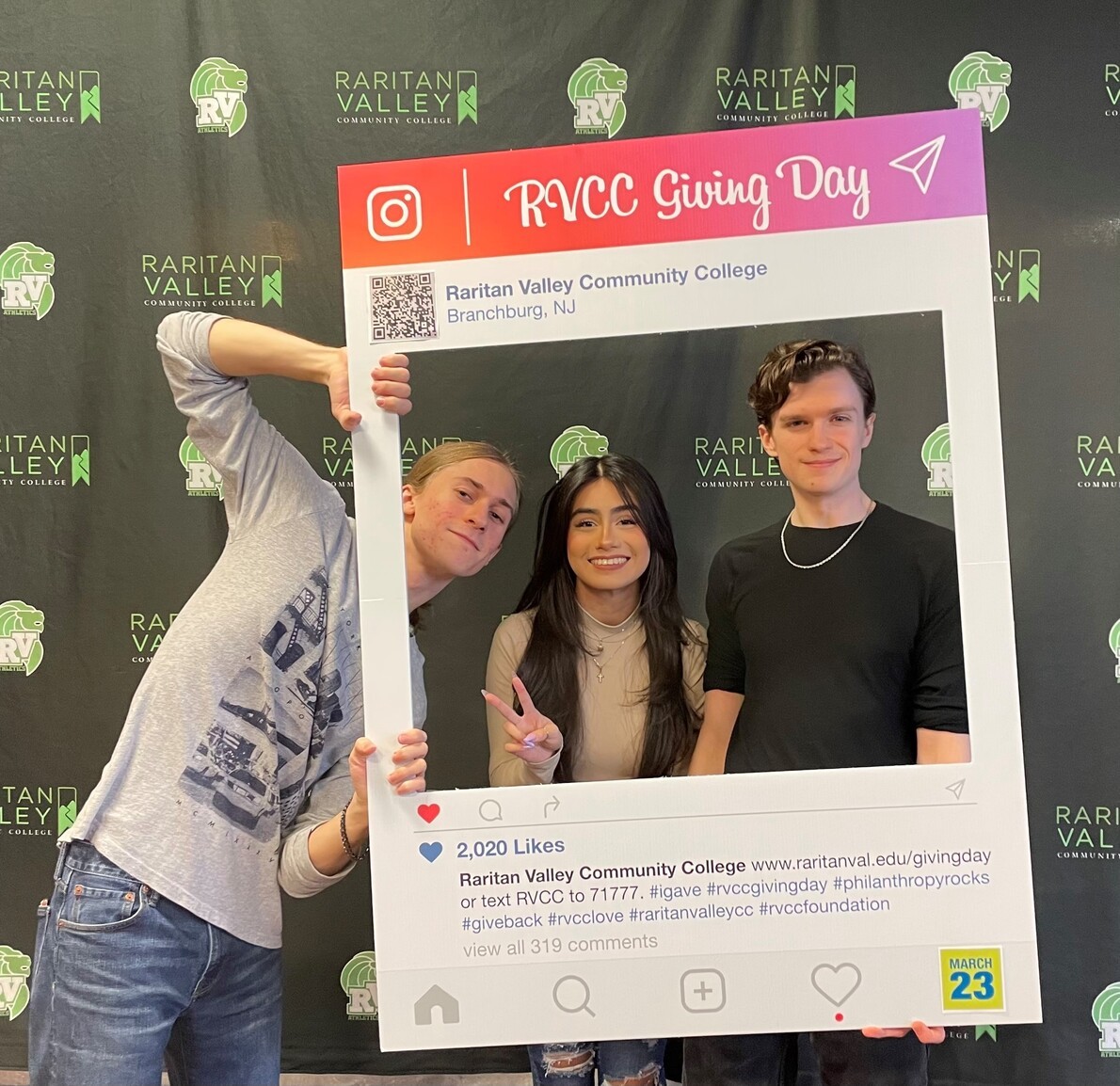 3 students with giving day photo frame