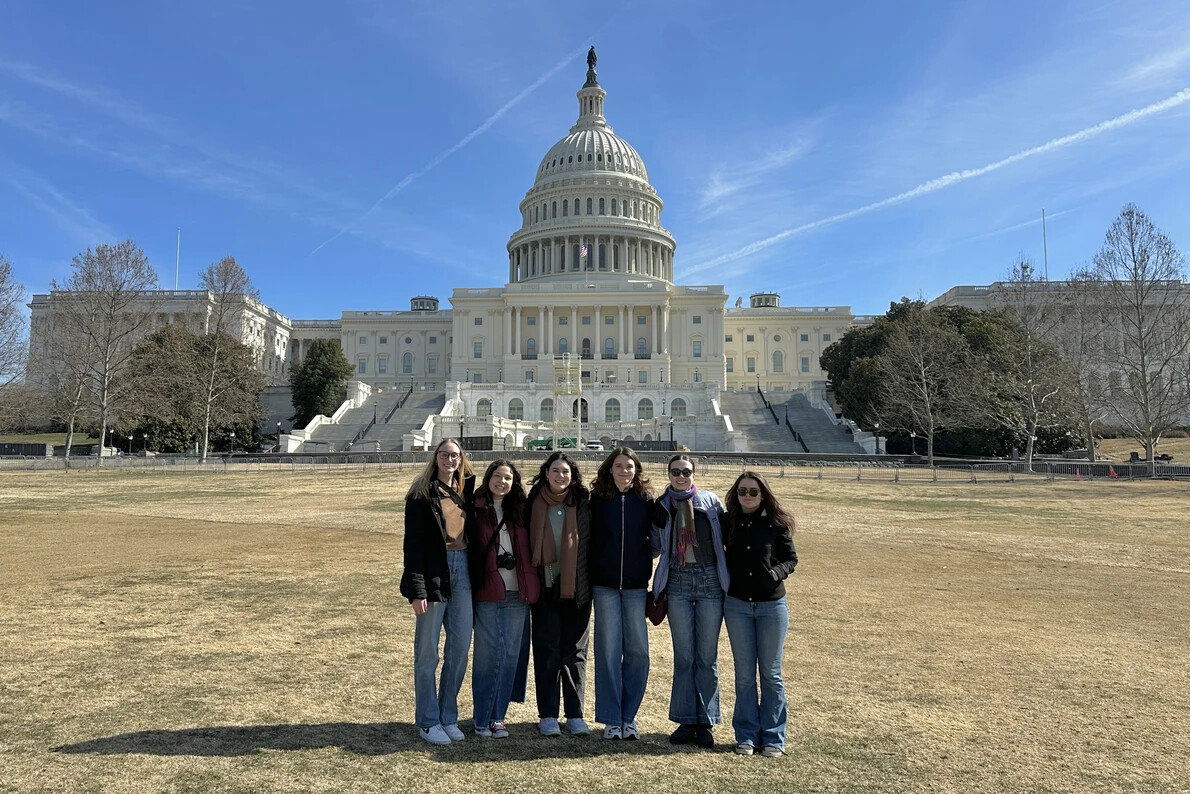 students with capitol in background