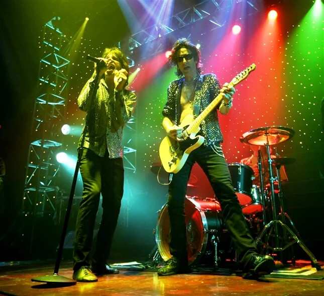 satisfaction band performing