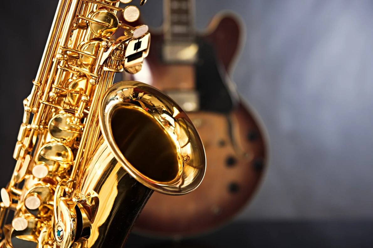 sax with guitar behind it