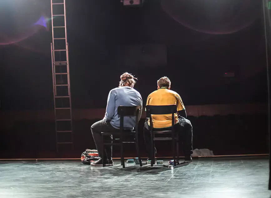 2 actors from the back