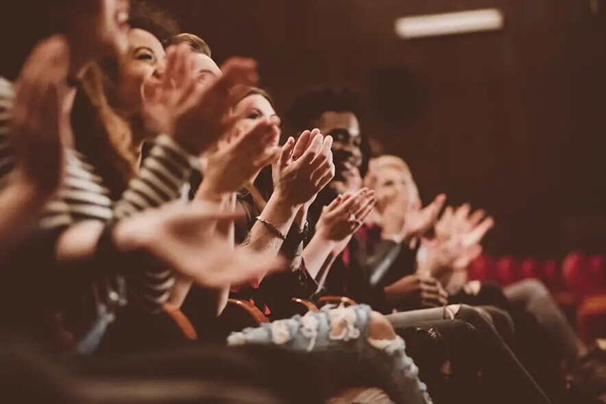audience applauding in theater