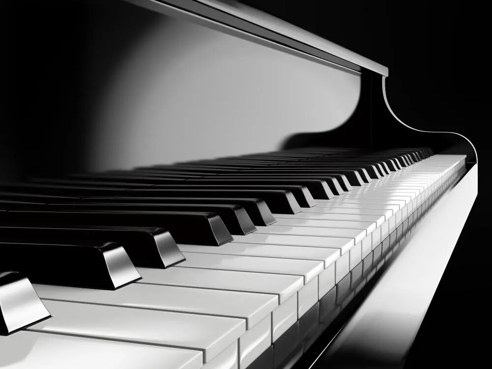black keys on black piano