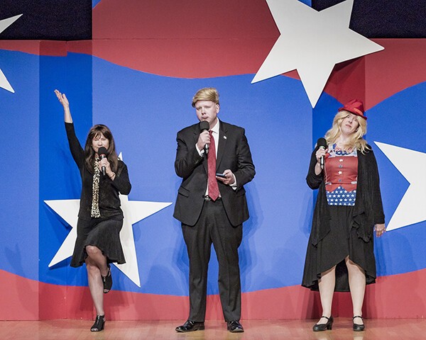 3 actors dressed as political characters