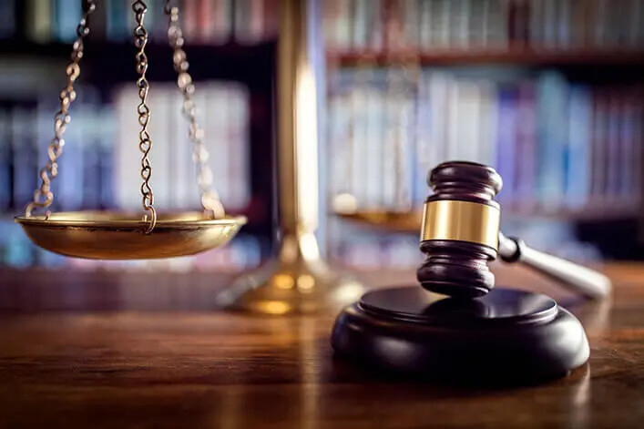 gavel, scales of justice, law books