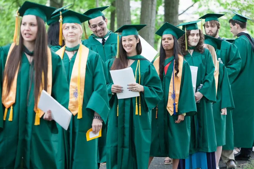 lines of graduates walking