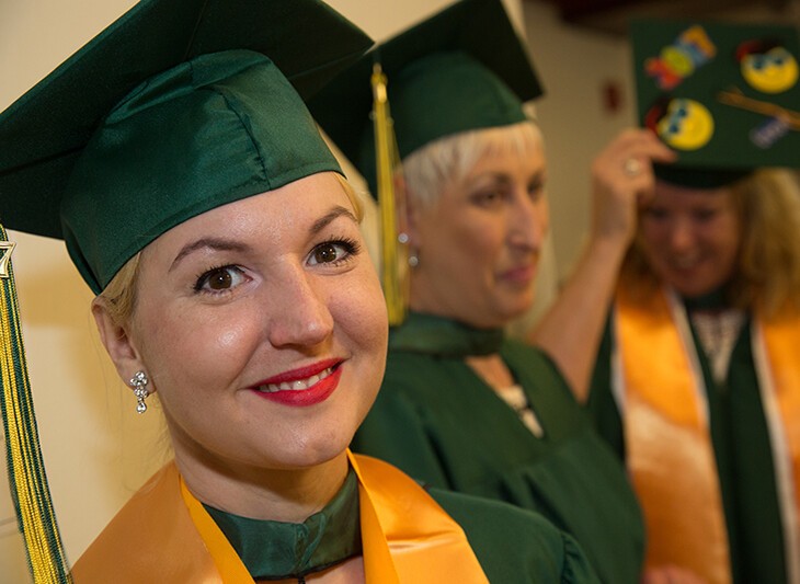 three older female grads