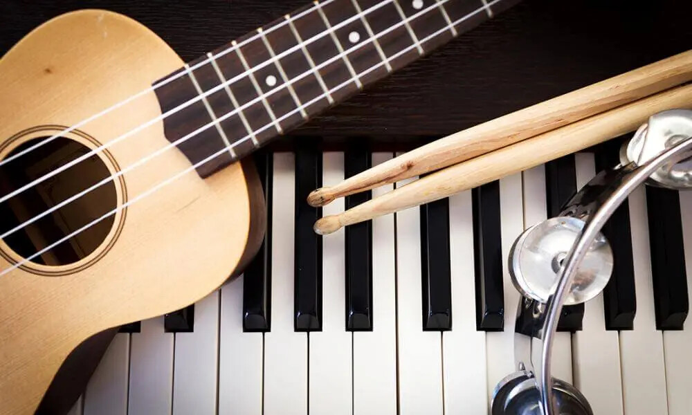 guitar with piano drum sticks