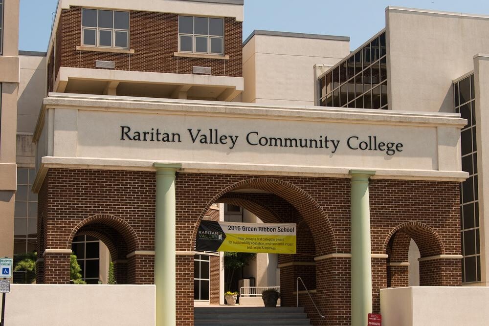 detail of RVCC sign and arches at front of college