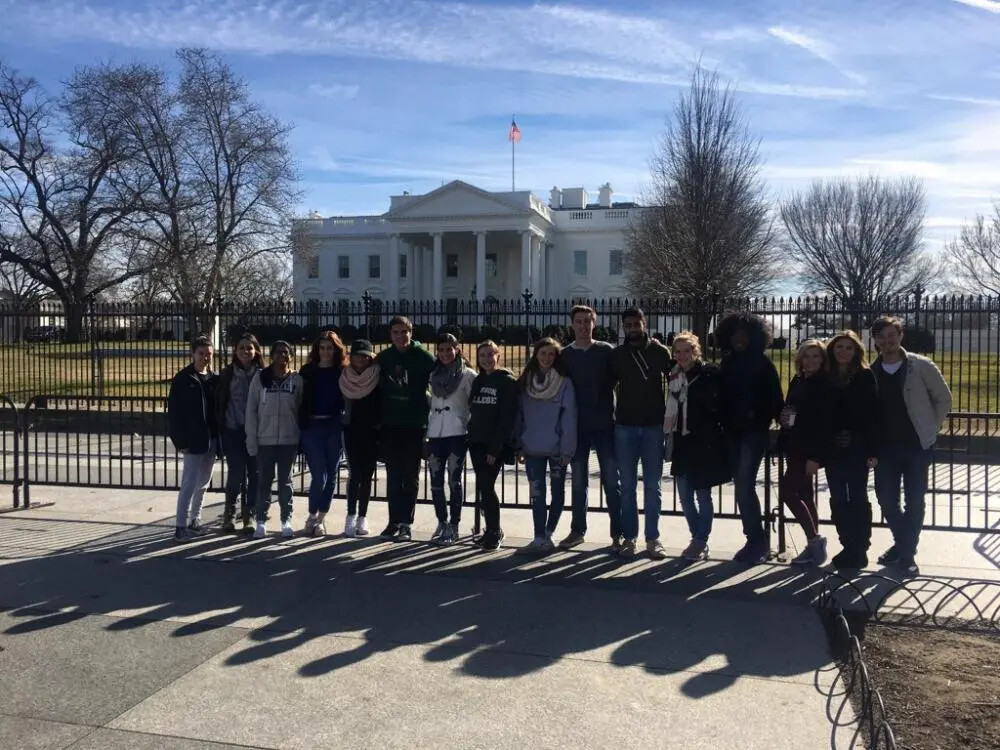 group of students in front of capitol