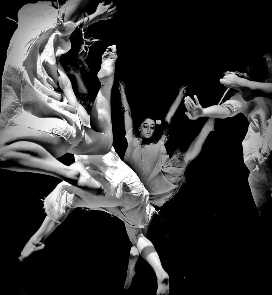 dancers leaping in air