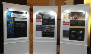 3 panels of Outbreak museum exhibit
