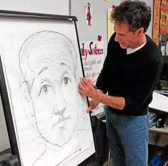 author catalanotto drawing on easel