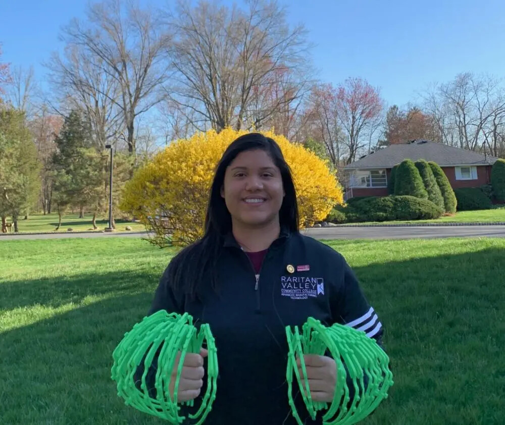 maria arevlo holding plastic headbands