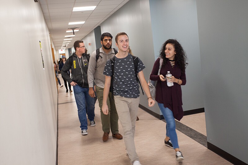 group of students walking in hallways