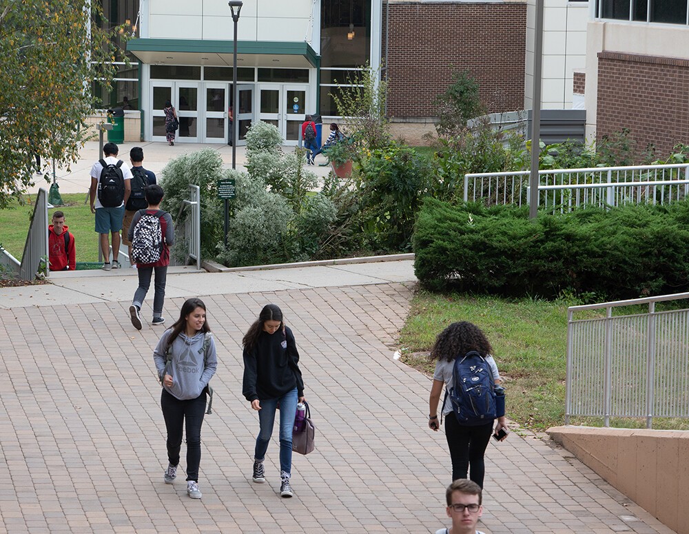 students walking near bateman center