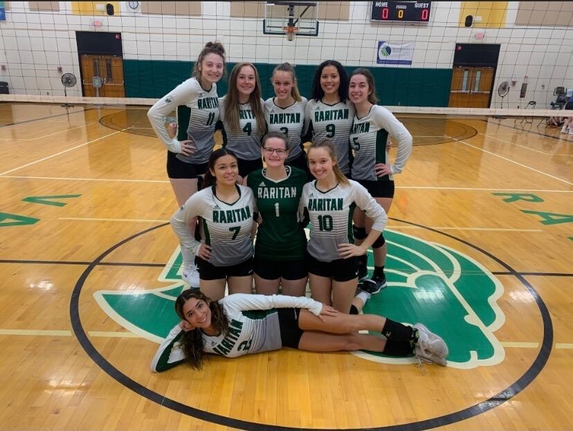 rvcc women's volleyball team in gym