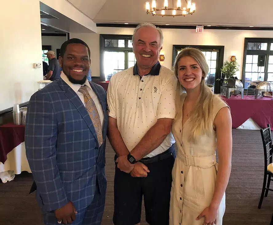 mike with 2 students at golf classic