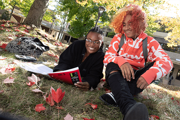 rvcc students studying on campus lawn