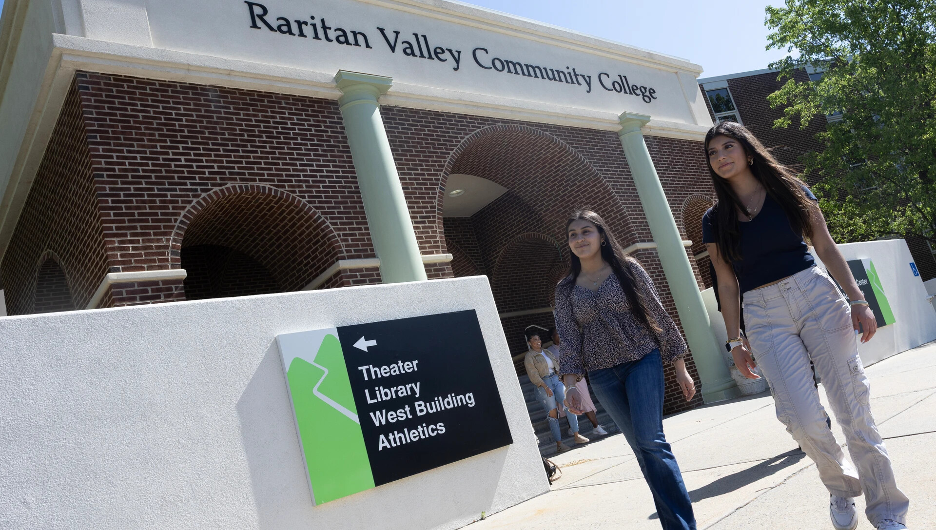 two students walking in front of RVCC