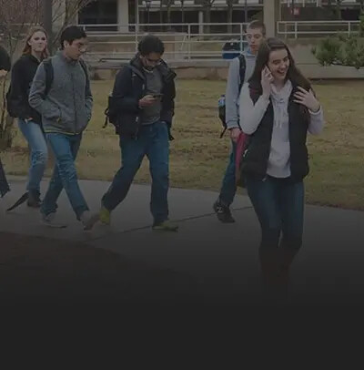 RVCC students in coats walking outside