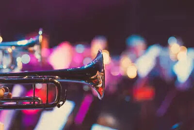 brass instruments and blurred colored lights
