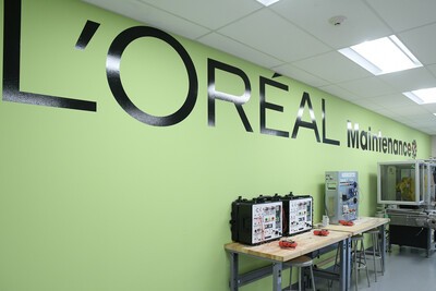 L'Oreal sign in room with equipment