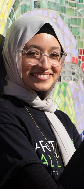 female student our side by mosaic