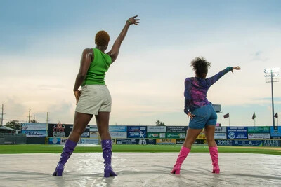 2 dancers outside viewed from the back