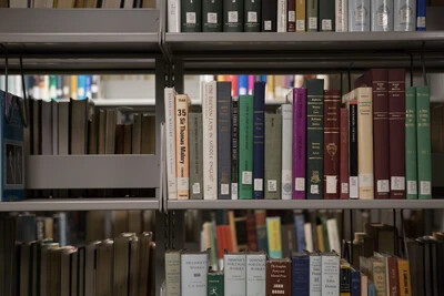 book shelves with books at library