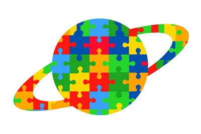colorful puzzle pieces filling a silhouette of saturn