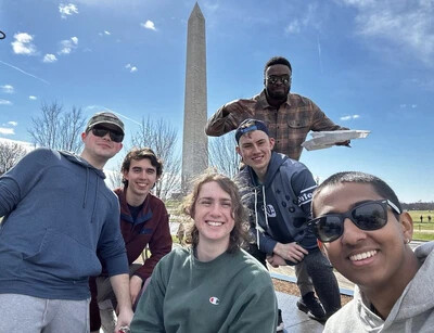 6 male honors college students with washington monument