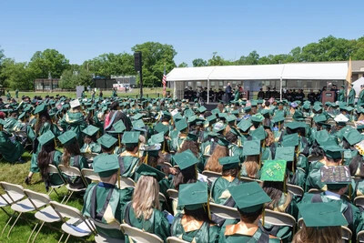 back of heads of graduates