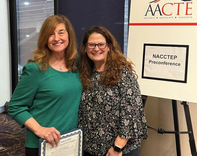 anita peterson and kathy suk at conference