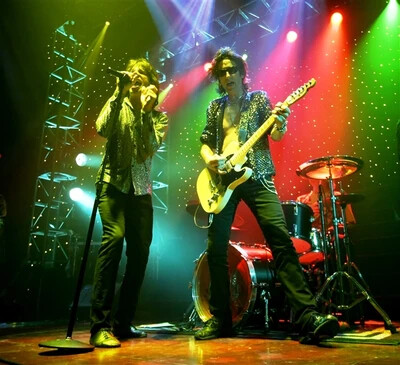 satisfaction band performing