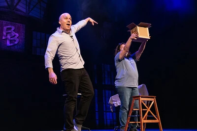 bill blagg and performing holding up box