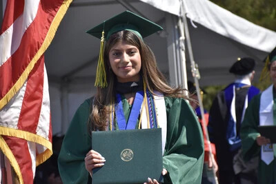 esmeralda with diploma case